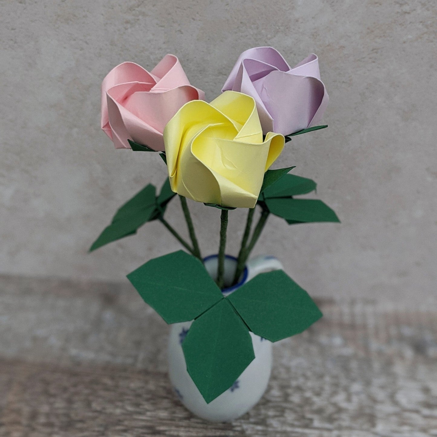 Long stem origami paper rose handmade from music or book paper