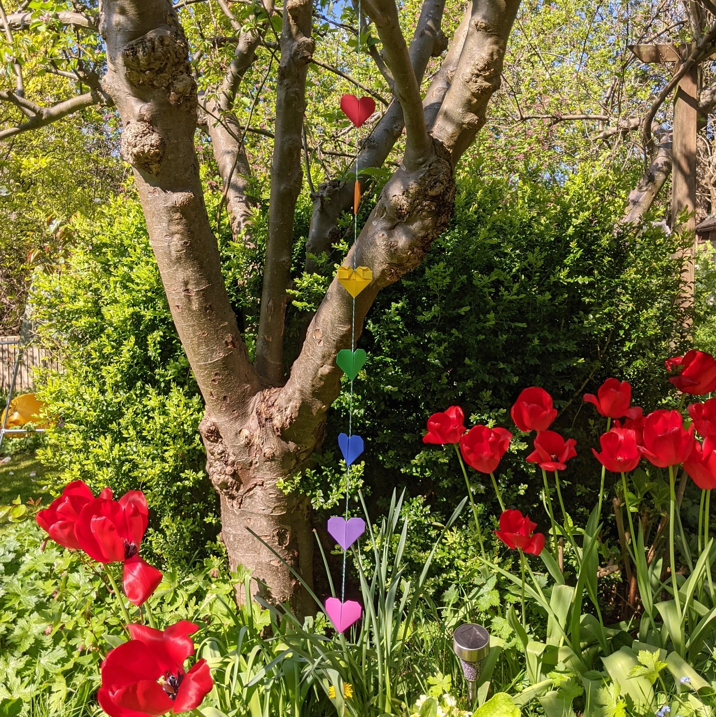 Rainbow origami hearts paper garland, colourful home decoration