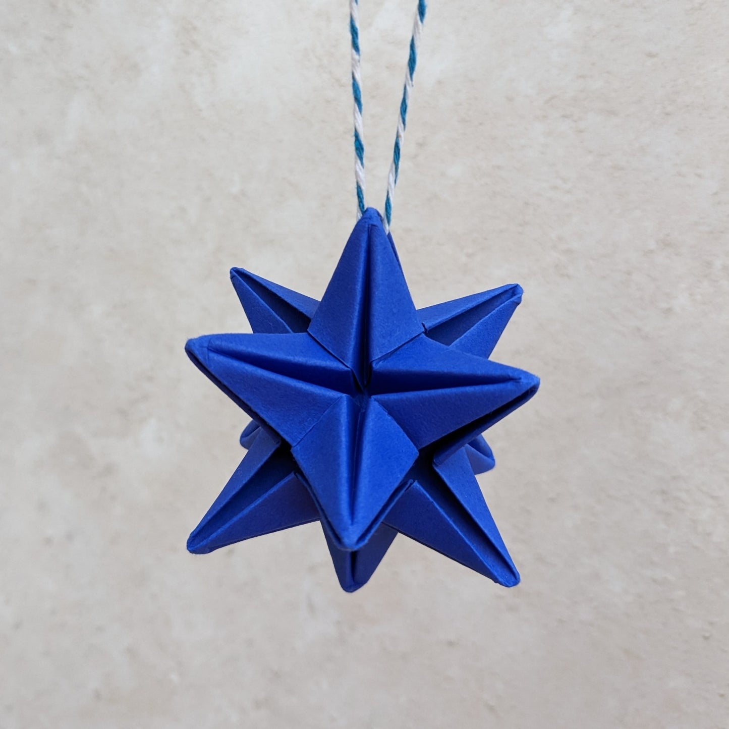 Origami paper star bauble, colourful Christmas tree decoration