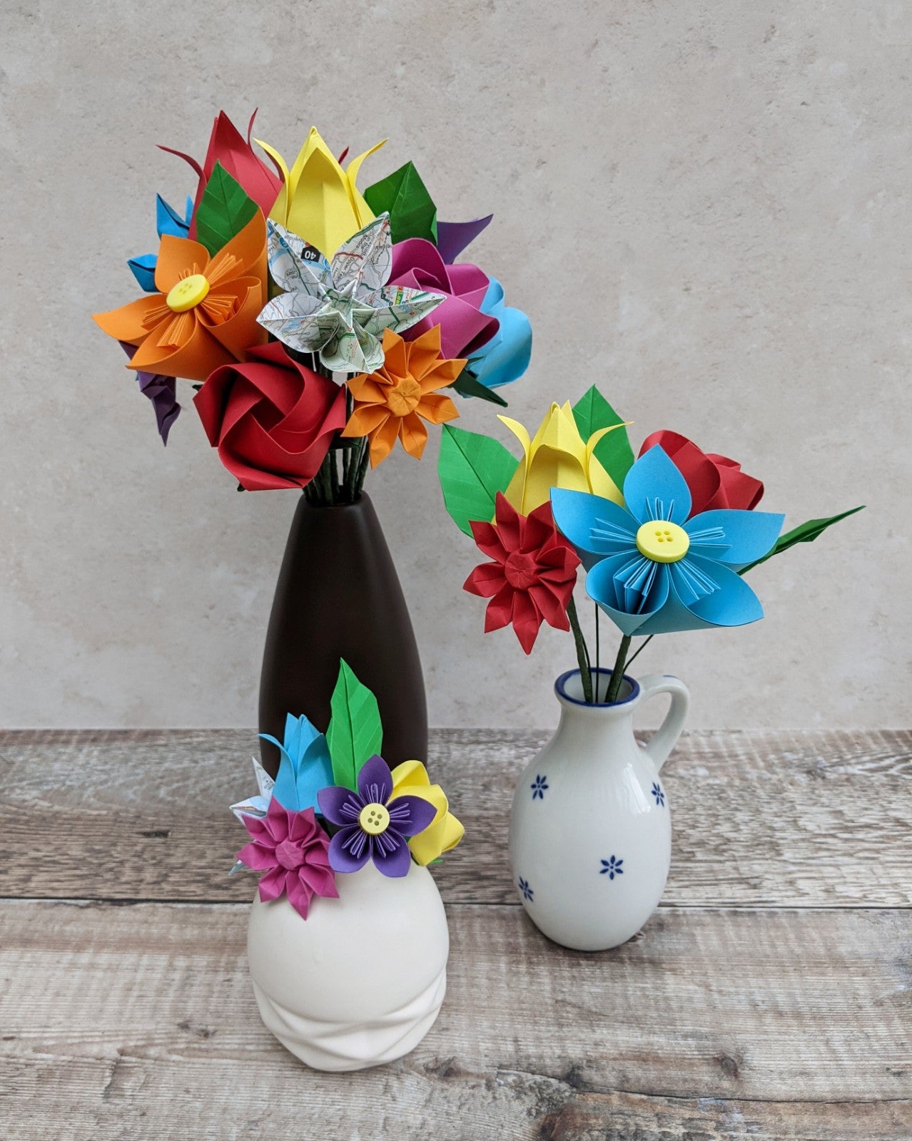 Colourful origami wedding bouquet with upcycled map paper flowers