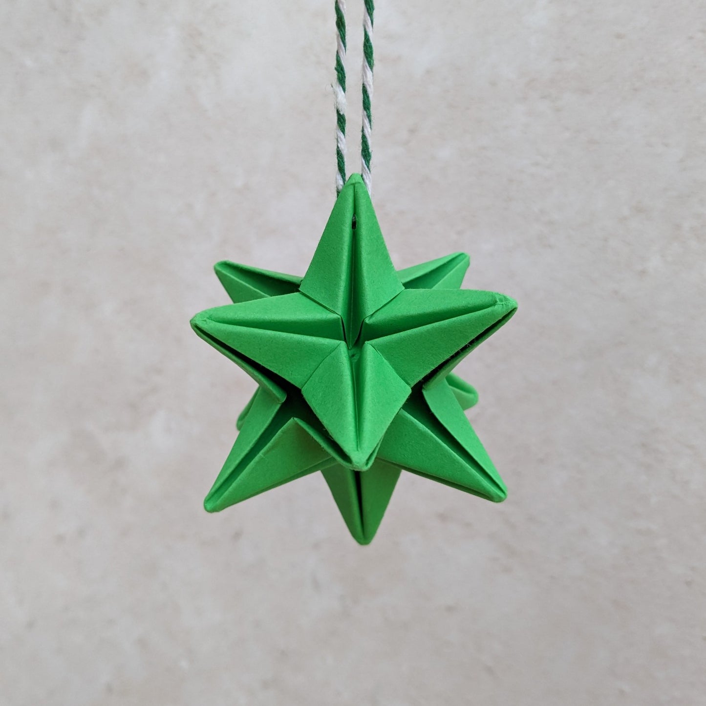 Origami paper star bauble, colourful Christmas tree decoration