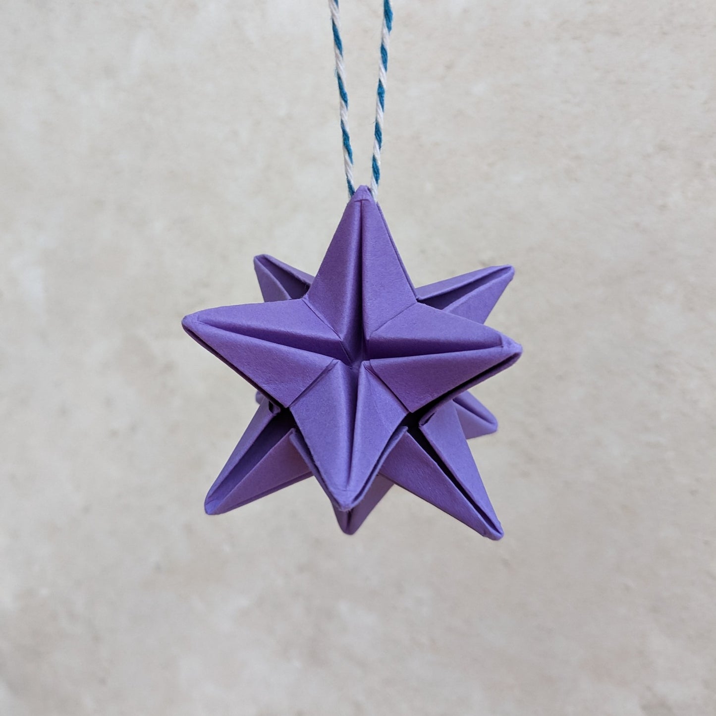 Origami paper star bauble, colourful Christmas tree decoration