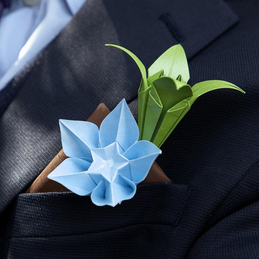Origami paper flowers buttonhole with a lily and a star flower