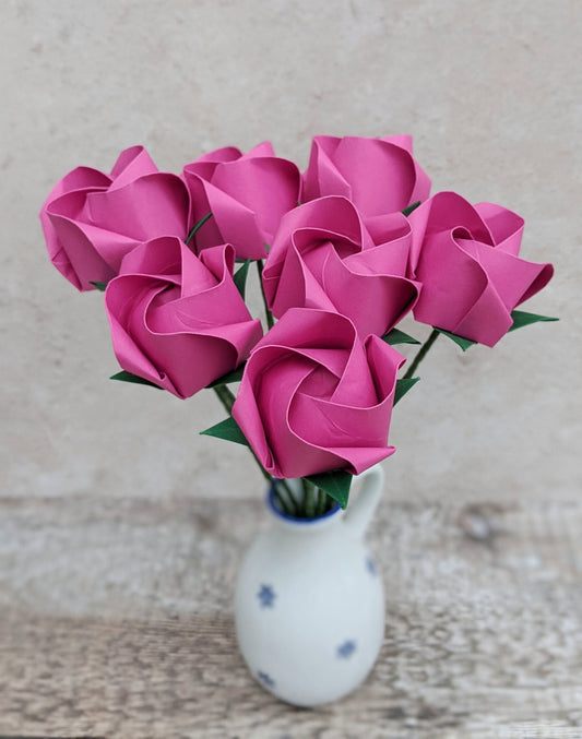 Bouquet of 7 hot pink origami paper roses in a vase