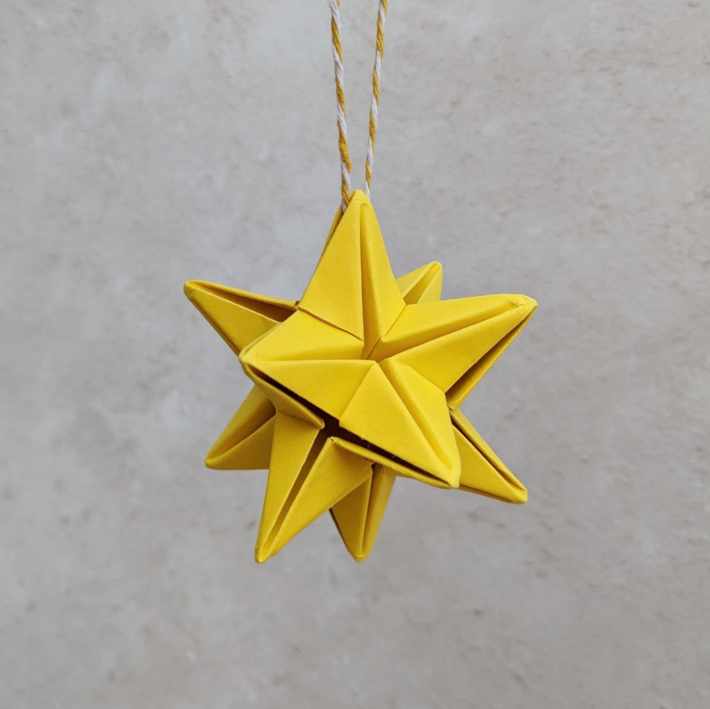 Origami paper star bauble, colourful Christmas tree decoration