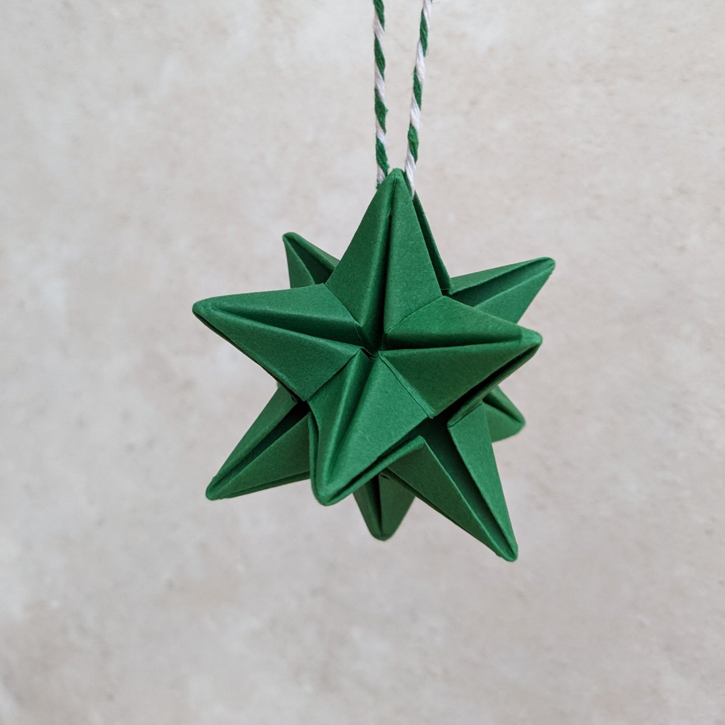 Origami paper star bauble, colourful Christmas tree decoration