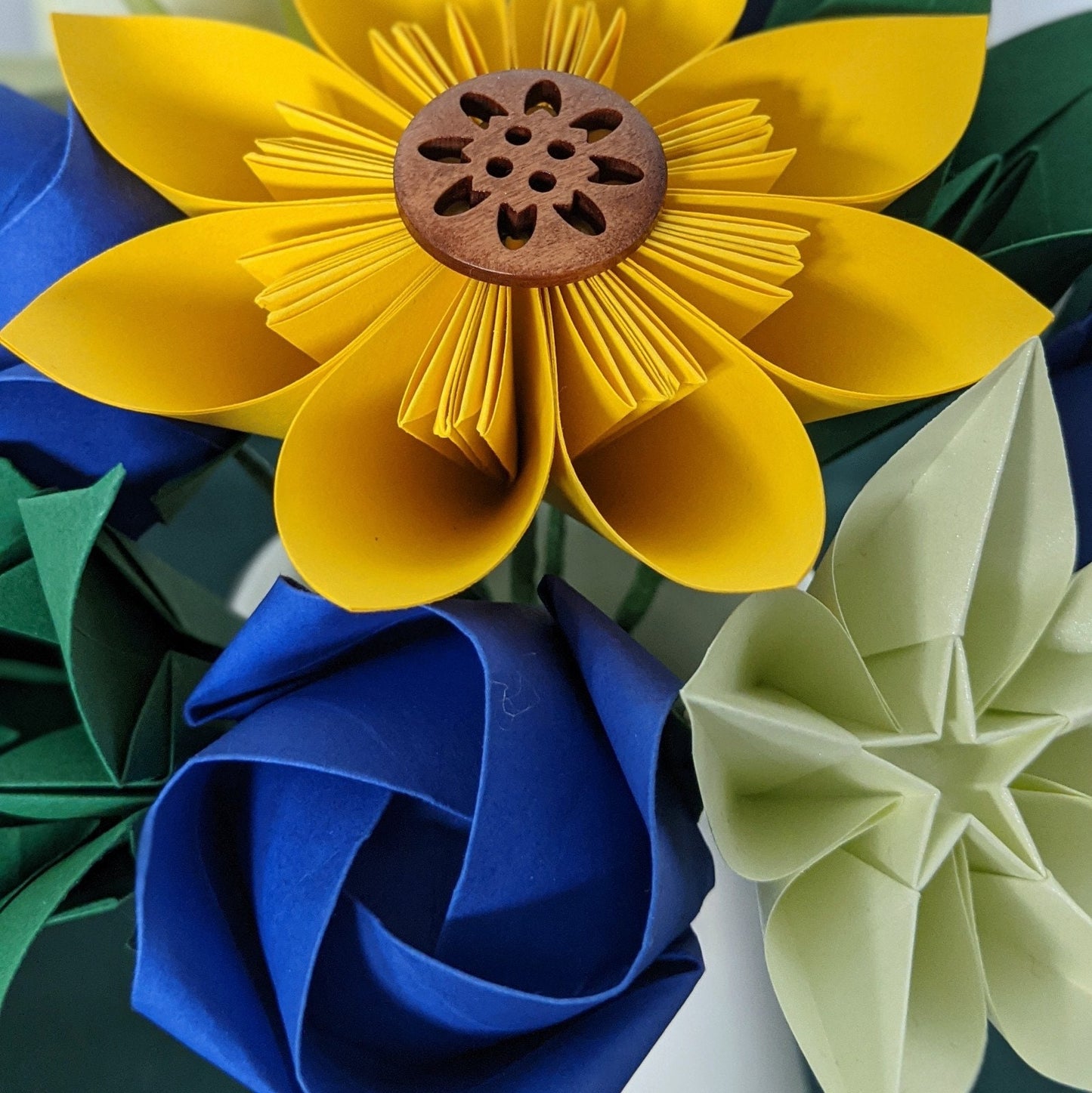 Bridesmaid's origami paper bouquet with sunflower