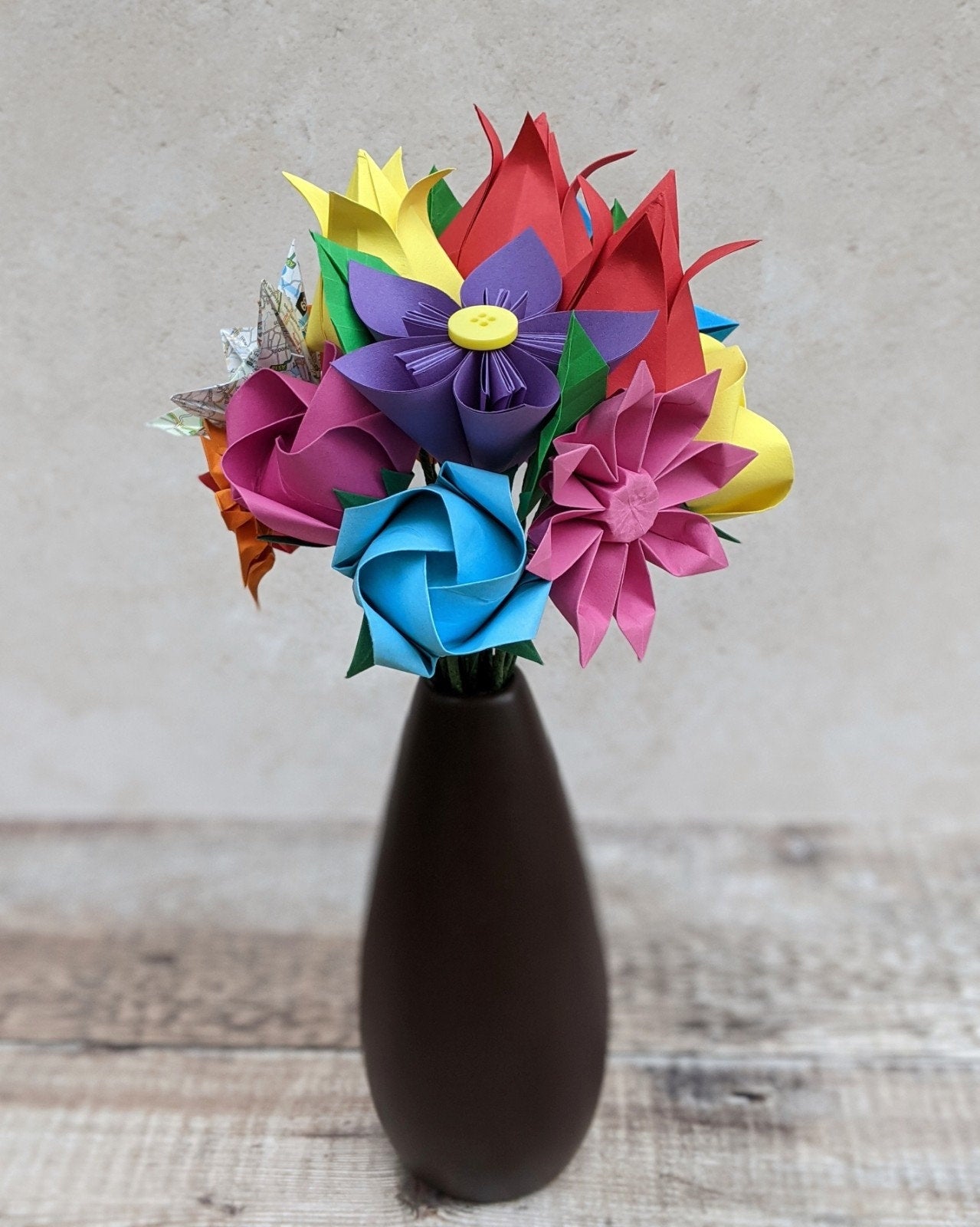 Colourful origami wedding bouquet with upcycled map paper flowers