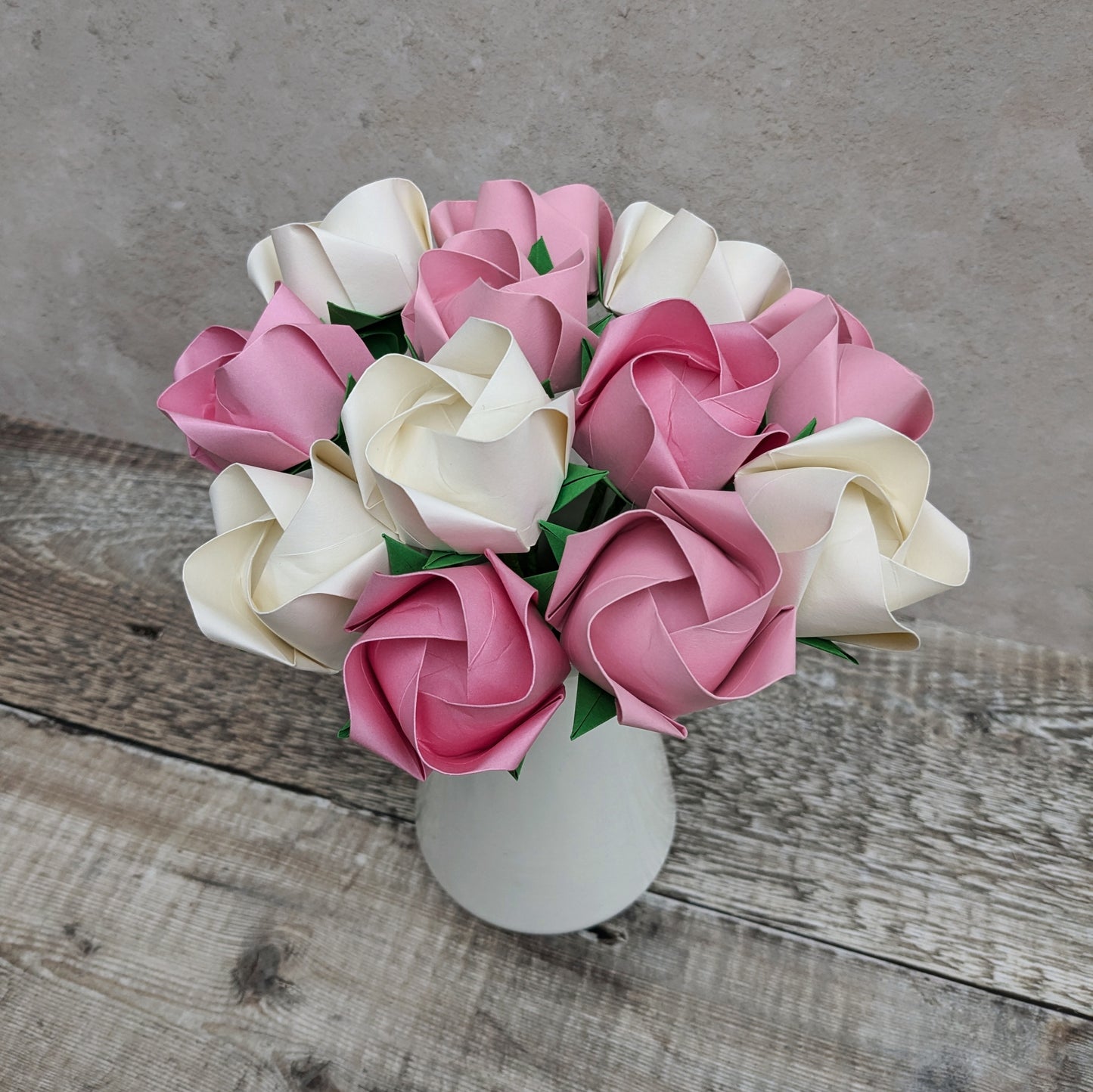 A dozen pastel paper roses, origami flowers bouquet