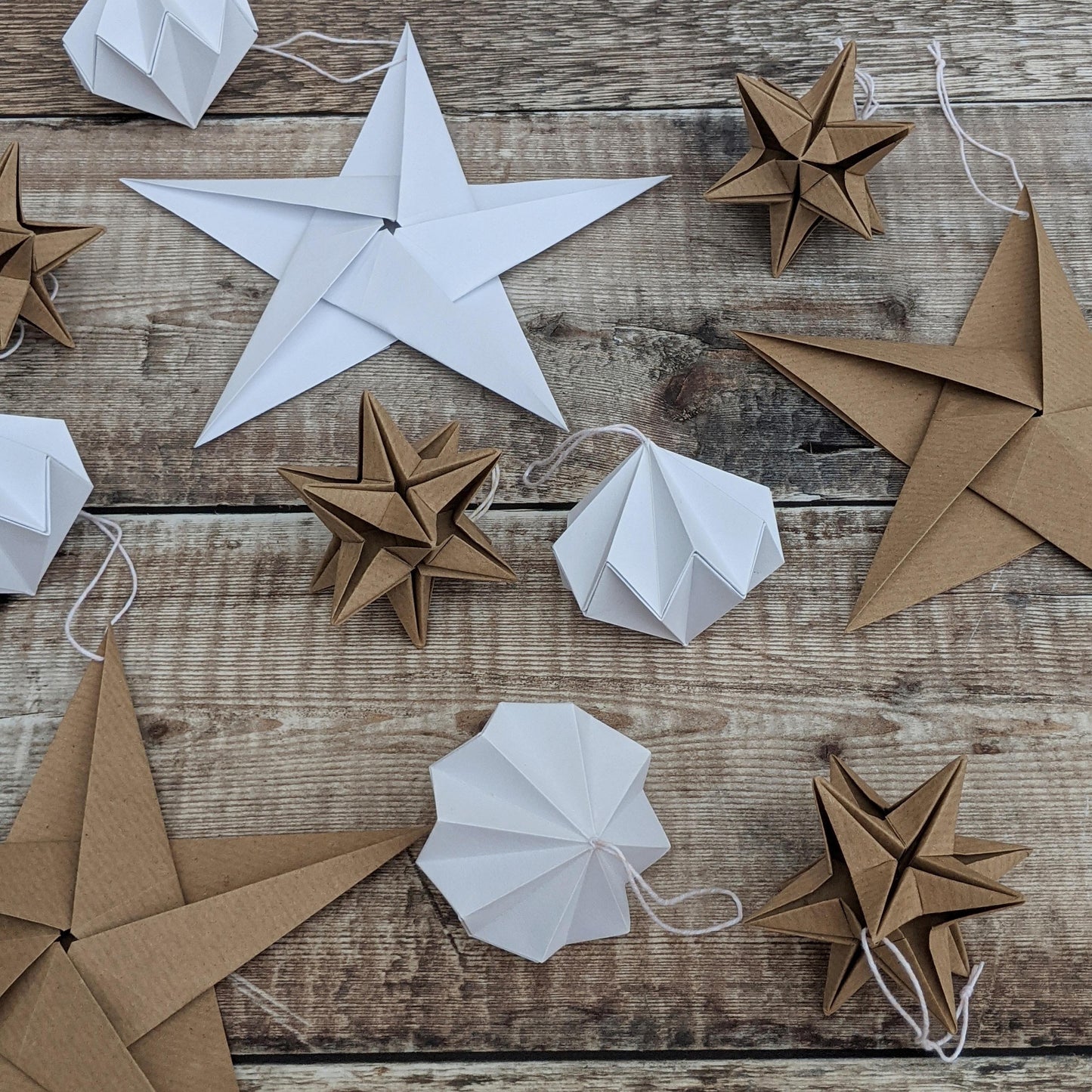 Handmade neutral paper star bauble, origami Christmas decoration