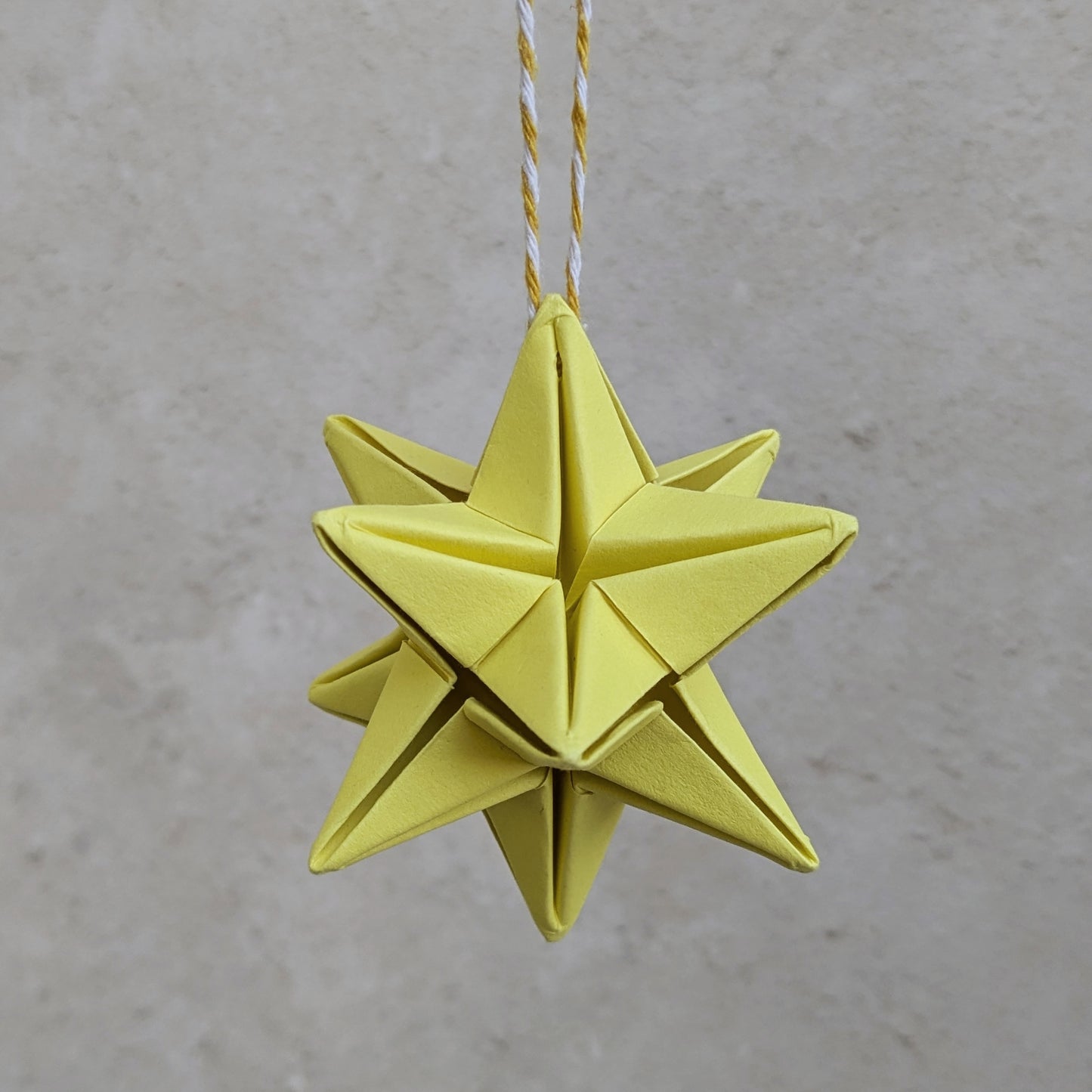 origami star decoration pastel yellow