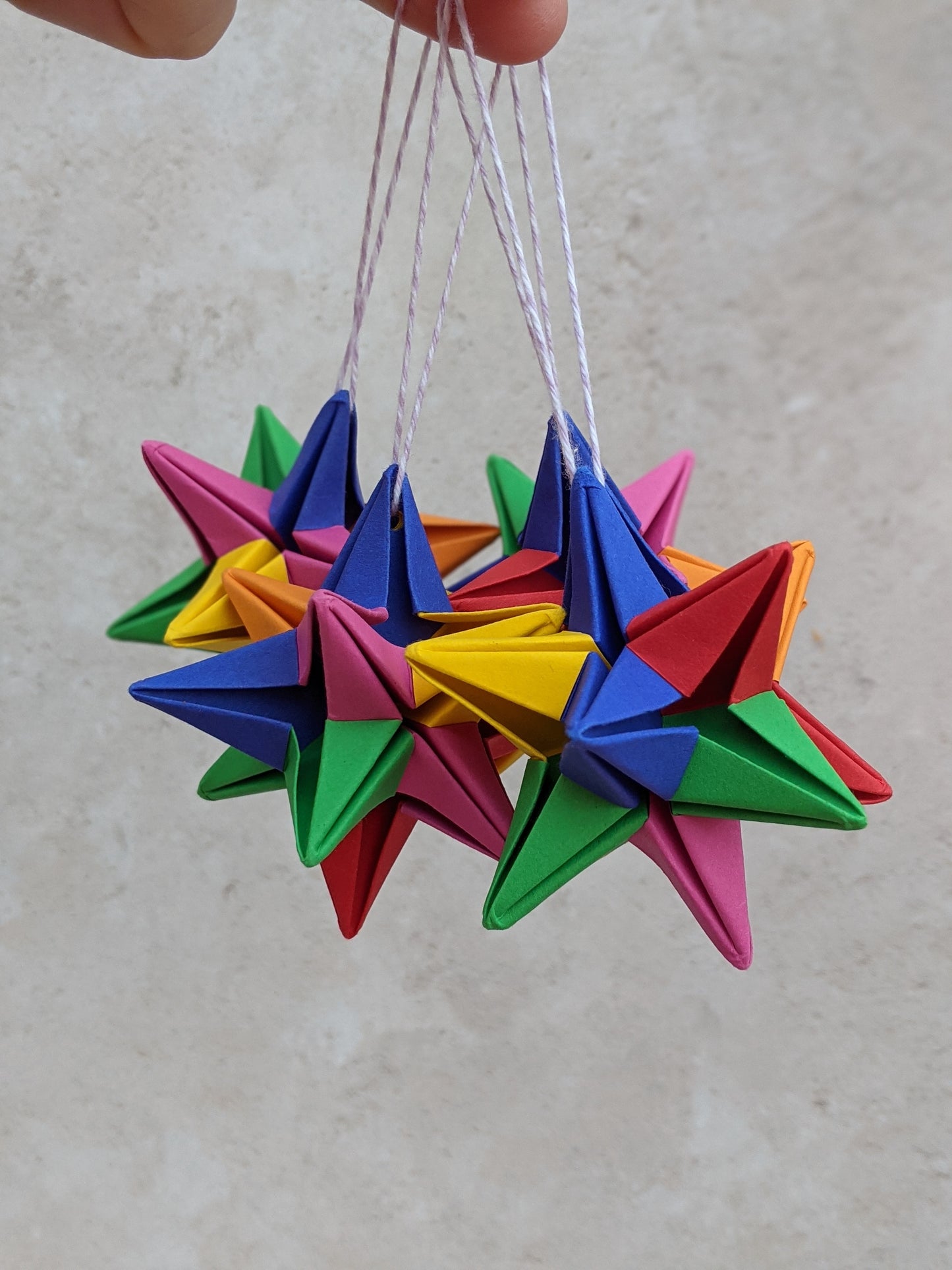 Origami paper star bauble, colourful Christmas tree decoration