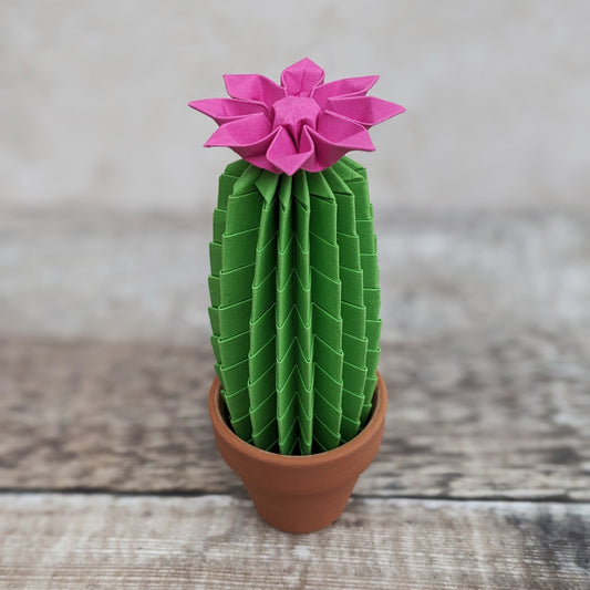 tall slim lime green paper cactus with origami pink flower in a mini terracotta pot